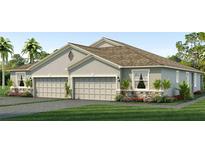 Two-story house with gray siding, three-car garage, and landscaping at 2375 Warren Acres Blvd, Wesley Chapel, FL 33543