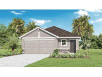 One-story home with a two-car garage and attractive landscaping at 5254 Salt Marsh Rd, Wimauma, FL 33598