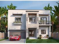 Modern two-story home with attached garage and balcony at 1003 W Ohio Ave, Tampa, FL 33603