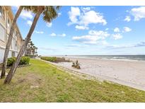 Steps to the beach! Enjoy ocean breezes and white sand at 3400 Gulf Blvd # 105, Belleair Beach, FL 33786