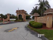 New Atlantis Club entrance with gated access at 12760 Indian Rocks Rd # 582, Largo, FL 33774