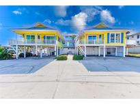 Two charming yellow beach cottages with parking at 1808 Gulf Blvd # 1, Indian Rocks Beach, FL 33785