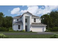 Two-story house with white siding, gray roof, and a two-car garage at 10625 Sun Drop St, Venice, FL 34293
