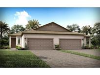 Two-story home with two car garage and attractive landscaping at 20393 Symphony Pl, Venice, FL 34293