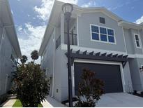 Beautiful two-story home with a two-car garage and manicured landscaping in a desirable neighborhood at 5727 Desert Rose Pl, Tampa, FL 33615