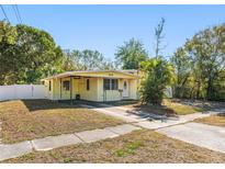 Charming single-story home with a well-maintained front yard and cozy porch area at 538 Southwest N Blvd, St Petersburg, FL 33703