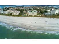 Aerial perspective showcasing the condo's prime beachfront location at 12000 Gulf Blvd # 309N, Treasure Island, FL 33706