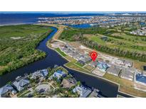 Property location shown from above, near water and other homes at 1074 Signet Dr, Apollo Beach, FL 33572