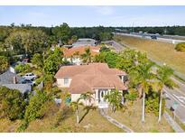 Aerial view of a single-Gathering home with surrounding houses and roads at 2201 30Th N Ave, St Petersburg, FL 33713