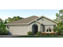 One-story house with a light gray exterior, two-car garage, and landscaped yard at 10911 Gentle Current Way, Parrish, FL 34219