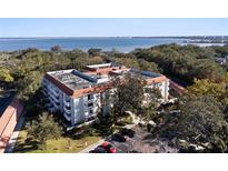 Condo building aerial view, showcasing waterfront location at 2650 Pearce Dr # 106, Clearwater, FL 33764