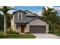 Two-story house with gray siding, red door, and a two-car garage at 13621 Newbridge St, Spring Hill, FL 34609