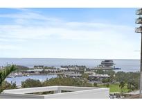 Breathtaking aerial view showcasing marina, stadium, and bay at 301 1St S St # 803, St Petersburg, FL 33701