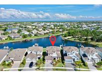 Beautiful waterfront property featuring a lovely home and dock access to a scenic canal with ocean access at 5221 Wishing Arch Dr, Apollo Beach, FL 33572