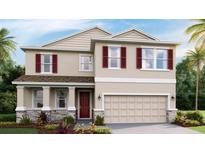 Two-story house with red shutters and stone accents at 5707 Silver Feather Way, Palmetto, FL 34221