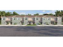 Six-unit townhome development showcasing modern design and attached garages at 4478 Rachel Falls Dr, Tampa, FL 33610