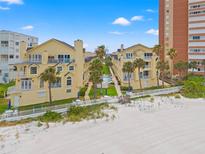 Aerial view of beachside community with pool and ocean access at 17960 Gulf Blvd # 115, Redington Shores, FL 33708