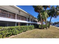 Building exterior showcasing a well-maintained building with lush landscaping at 2348 Shelley St # 4, Clearwater, FL 33765