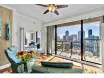 Bright living room featuring floor to ceiling windows and a stunning city view at 226 5Th N Ave # 1502, St Petersburg, FL 33701