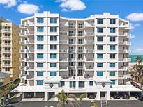 Stylish condo building showcasing contemporary architecture with lots of balconies at 1350 Gulf Blvd, Clearwater, FL 33767
