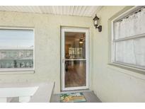Inviting front entrance with a storm door and a 