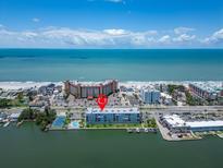 Coastal condo complex with beautiful water views, tennis court, and boat slips at 18325 Gulf Blvd # 407, Redington Shores, FL 33708