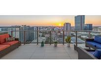 Enjoy the sunrise from this condo's balcony, complete with tile floors and comfortable outdoor seating at 301 1St S St # 2006, St Petersburg, FL 33701
