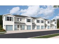 Charming townhomes boast a modern design with light blue doors and shutters at 4652 Pleasant Ave, Palm Harbor, FL 34683