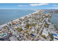 Island home near clear ocean and white sand beaches offering stunning coastal living in paradise at 128 Bay Plz, Treasure Island, FL 33706