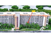 This shows the outside of the building and highlights unit #209 at 5400 Park N St # 209, St Petersburg, FL 33709