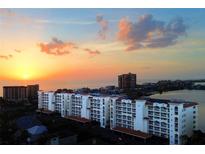 Beautiful condo complex with waterfront view and sunset over the ocean at 17717 Gulf Blvd # 601, Redington Shores, FL 33708