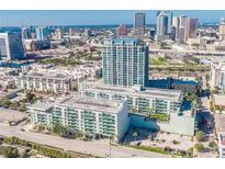 Stunning aerial view of a luxury apartment complex in downtown Tampa with modern architecture and beautiful city skyline backdrop at 111 N 12Th St # 1619, Tampa, FL 33602