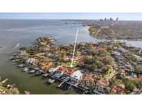 Stunning waterfront property boasting a private dock and panoramic views of the bay and city skyline at 801 Brightwaters Ne Blvd, St Petersburg, FL 33704