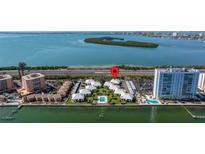 Waterfront condos offer a pool, parking, and easy access to the beach and nearby amenities at 7300 Sunshine Skyway S Ln # 202, St Petersburg, FL 33711