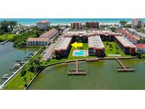 Waterfront condos with a community pool, private boat docks, and close proximity to beaches at 19701 Gulf Blvd # 328, Indian Shores, FL 33785