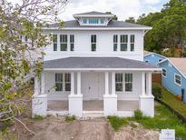 New two-story home with a large front porch and classic white columns at 5327 6Th N Ave, St Petersburg, FL 33710