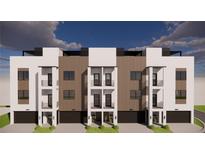 Modern townhome building with multi-tone facade, balconies, black accents and individual garages at 10350 2Nd N Way # Bldg 5, St Petersburg, FL 33716