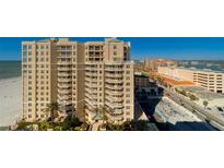Beautiful condominium building with a view of the beach and the ocean at 10 Papaya St # 1404, Clearwater Beach, FL 33767