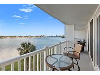 Enjoy this waterfront condo balcony with ample seating and stunning views at 500 Treasure Island Cswy # 308, Treasure Island, FL 33706