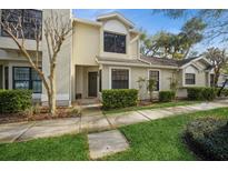 Inviting exterior of home featuring manicured landscaping, neutral colors, and a well-maintained walkway at 5100 Burchette Rd # 306, Tampa, FL 33647