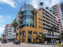 Bright condominium building featuring a unique cylindrical architectural design at 1120 E Kennedy Blvd # 1523, Tampa, FL 33602