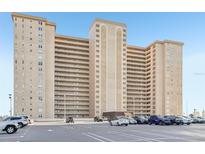 Expansive condo complex with multiple units and balconies, convenient parking, and a well-maintained exterior at 5200 Brittany S Dr # 902, St Petersburg, FL 33715