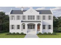 Stunning two-story white home features classic shutters and inviting front porch at 805 17Th Ne Ave, St Petersburg, FL 33704