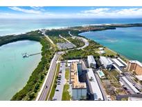 Stunning coastal condo complex with beach access, pool, and breathtaking views of the Gulf Coast at 9 Forbes Pl # 206, Dunedin, FL 34698