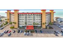 A beautiful beachfront building with a meticulously maintained parking lot at 18304 Gulf Blvd # 217, Redington Shores, FL 33708