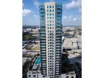 Stunning high-rise building featuring modern architecture, balconies, and beautiful city and water views at 777 N Ashley Dr # 1915, Tampa, FL 33602