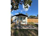 Charming home with a tidy front yard and a welcoming entrance at 3623 N 53Rd St, Tampa, FL 33619
