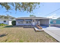 Charming single-story home with a covered carport and welcoming front entrance at 1520 S Richard Ave, Tampa, FL 33629