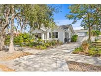 Charming exterior view of a single-story home with well-maintained landscaping at 2721 12Th N St, St Petersburg, FL 33704