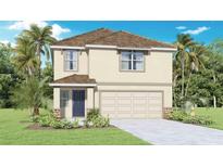 Inviting two-story home featuring a neutral color scheme, a two-car garage, and tropical landscaping at 5243 Salt Marsh Rd, Wimauma, FL 33598
